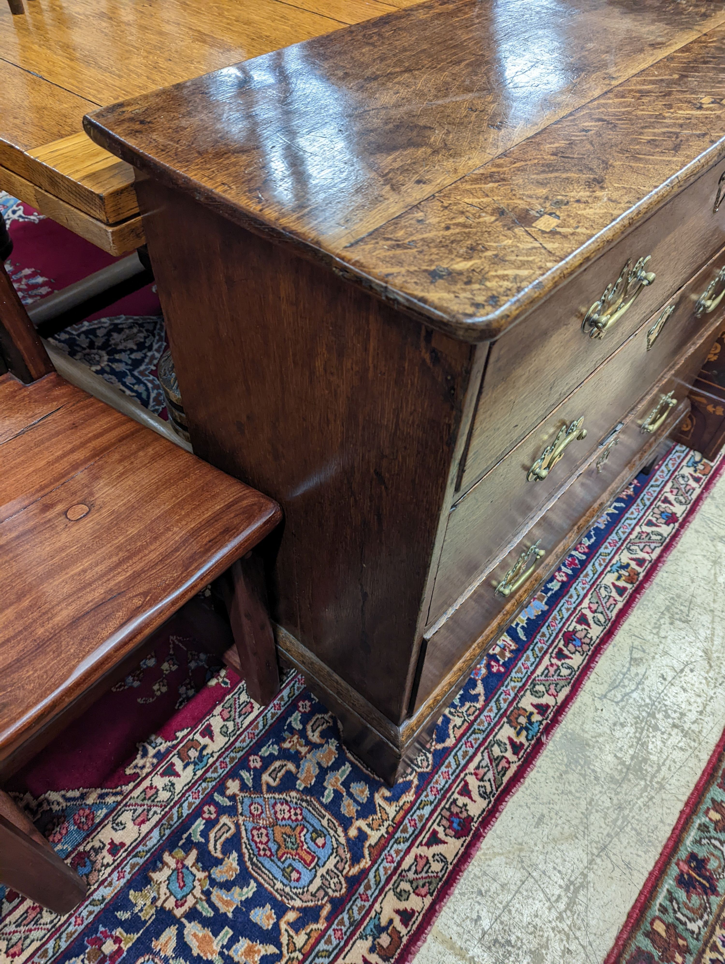 An 18th century oak three drawer chest, width 92cm, depth 39cm, height 80cm